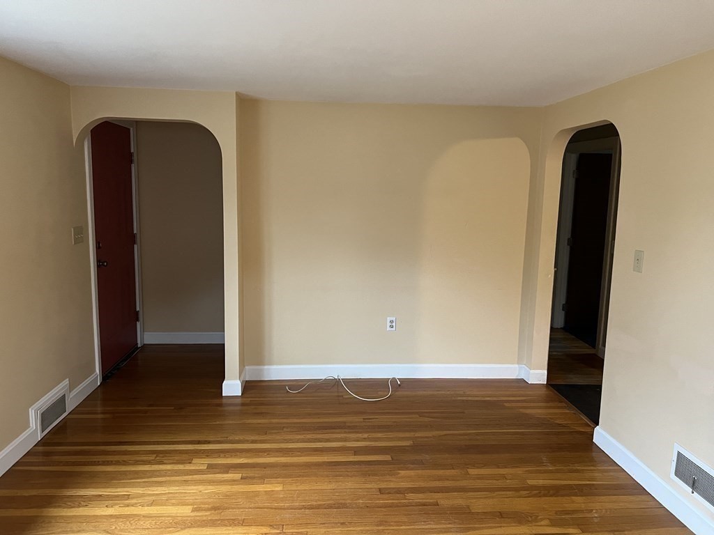 25 Margaret Road Hamilton, MA 01982 - Photo 11 of 33 a view of a room with wooden floor