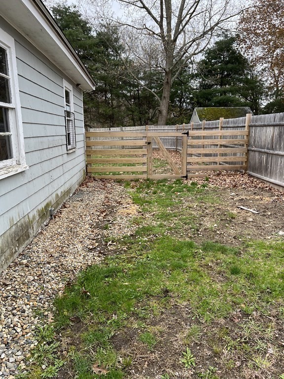 25 Margaret Road Hamilton, MA 01982 - Photo 24 of 33 a view of a backyard with trees