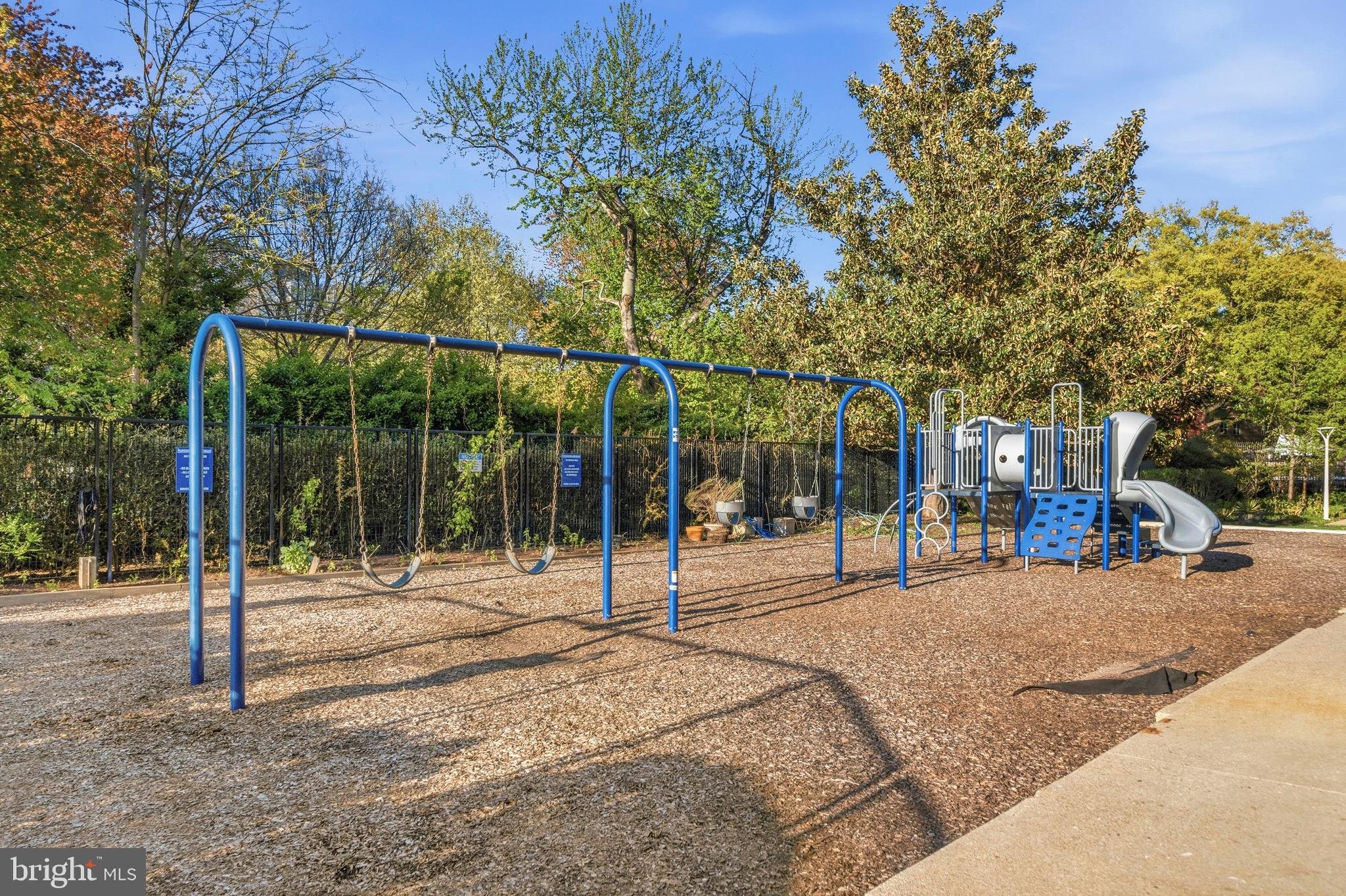 1311 Delaware Avenue Southwest, Unit S240 Washington, DC 20024 - Photo 18 of 25 a view of a park that has a tree on the side of the road