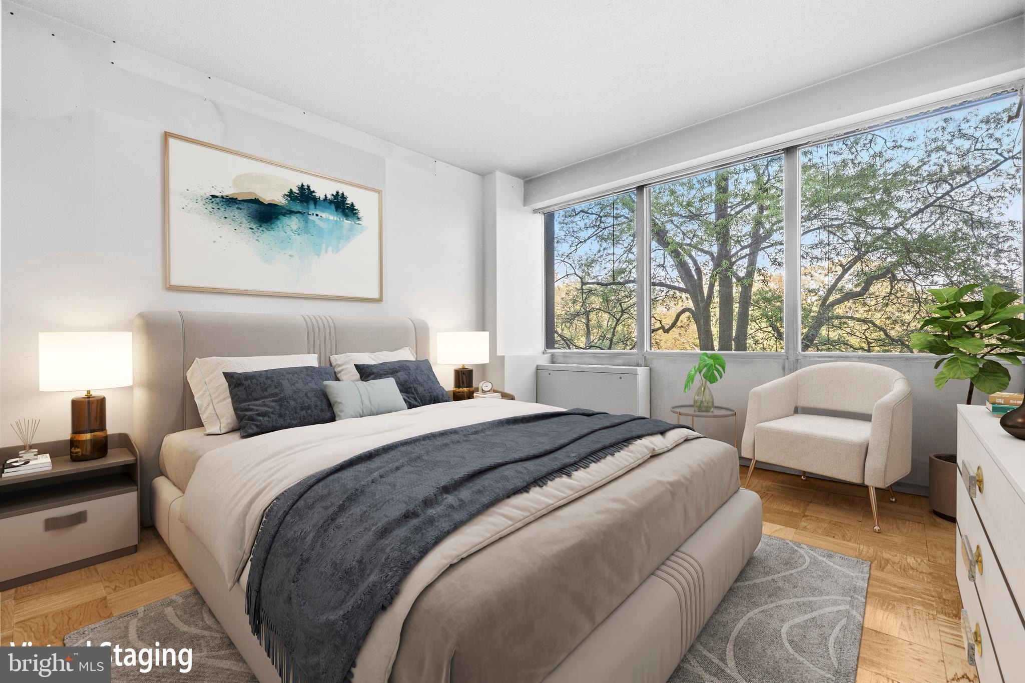 1311 Delaware Avenue Southwest, Unit S240 Washington, DC 20024 - Photo 8 of 25 a bedroom with a bed and a large window