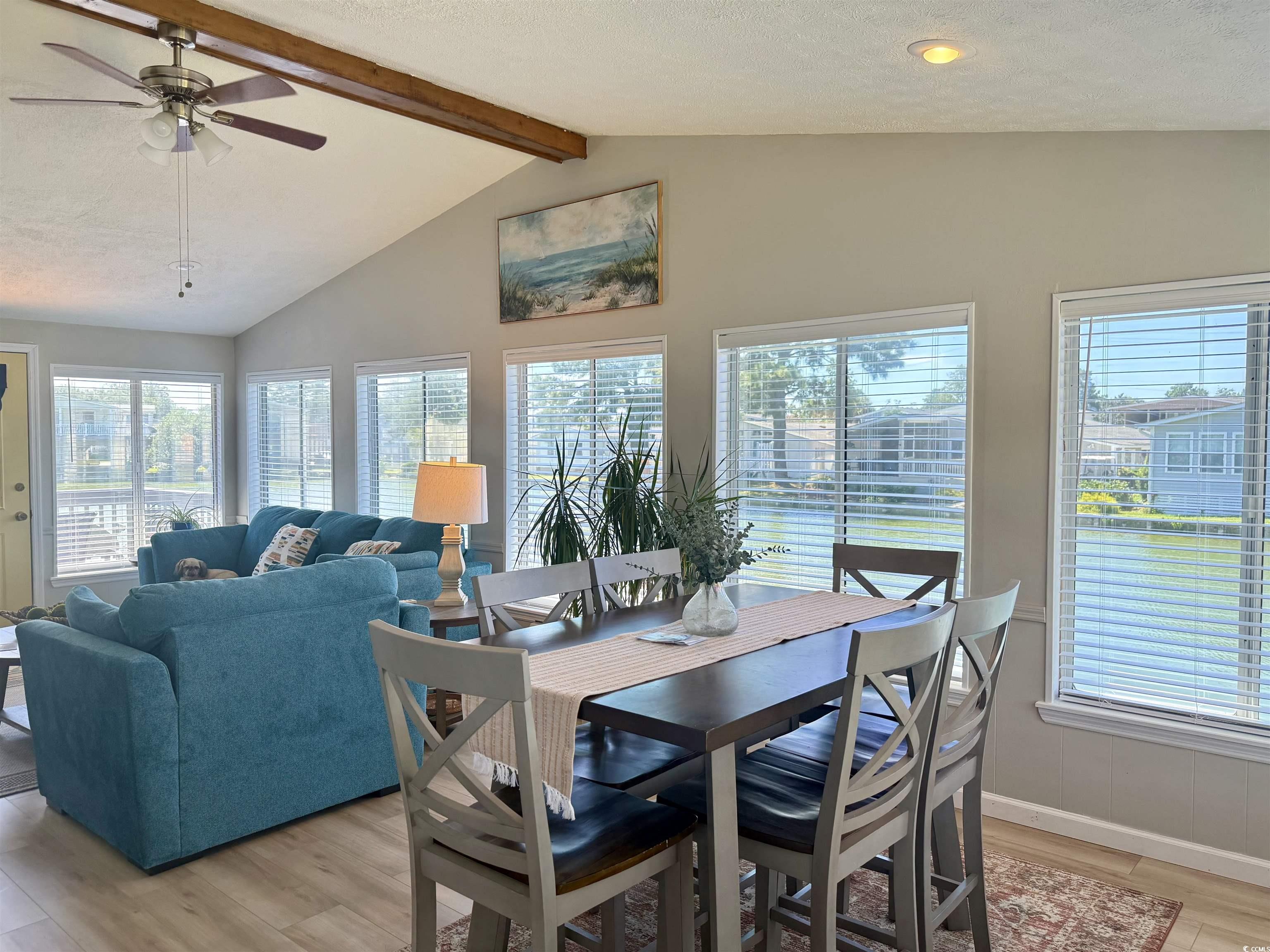 405 Twin Lakes Surfside Beach, SC 29575 - Photo 12 of 36 Dining space featuring a textured ceiling, light wood finished floors, and a ceiling fan