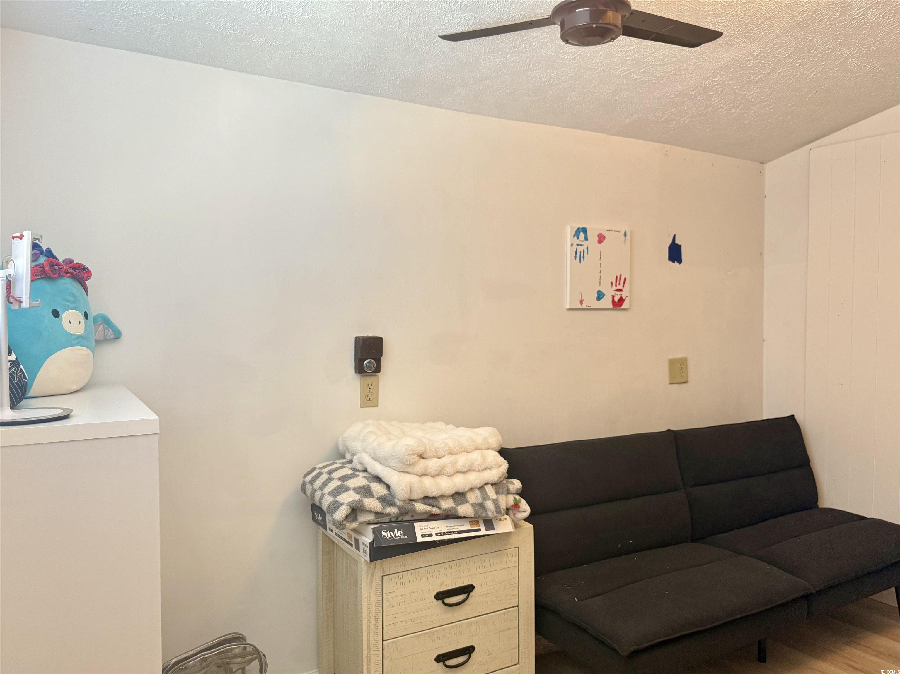 405 Twin Lakes Surfside Beach, SC 29575 - Photo 22 of 36 Sitting room with a textured ceiling, ceiling fan, and wood finished floors