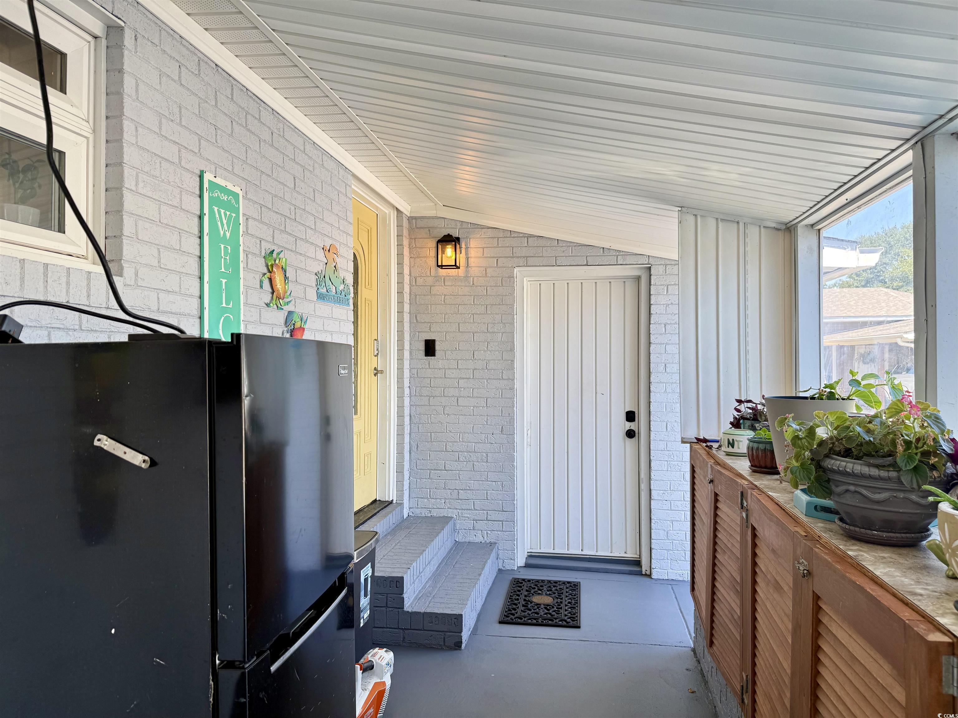 405 Twin Lakes Surfside Beach, SC 29575 - Photo 28 of 36 Sunroom / solarium with vaulted ceiling