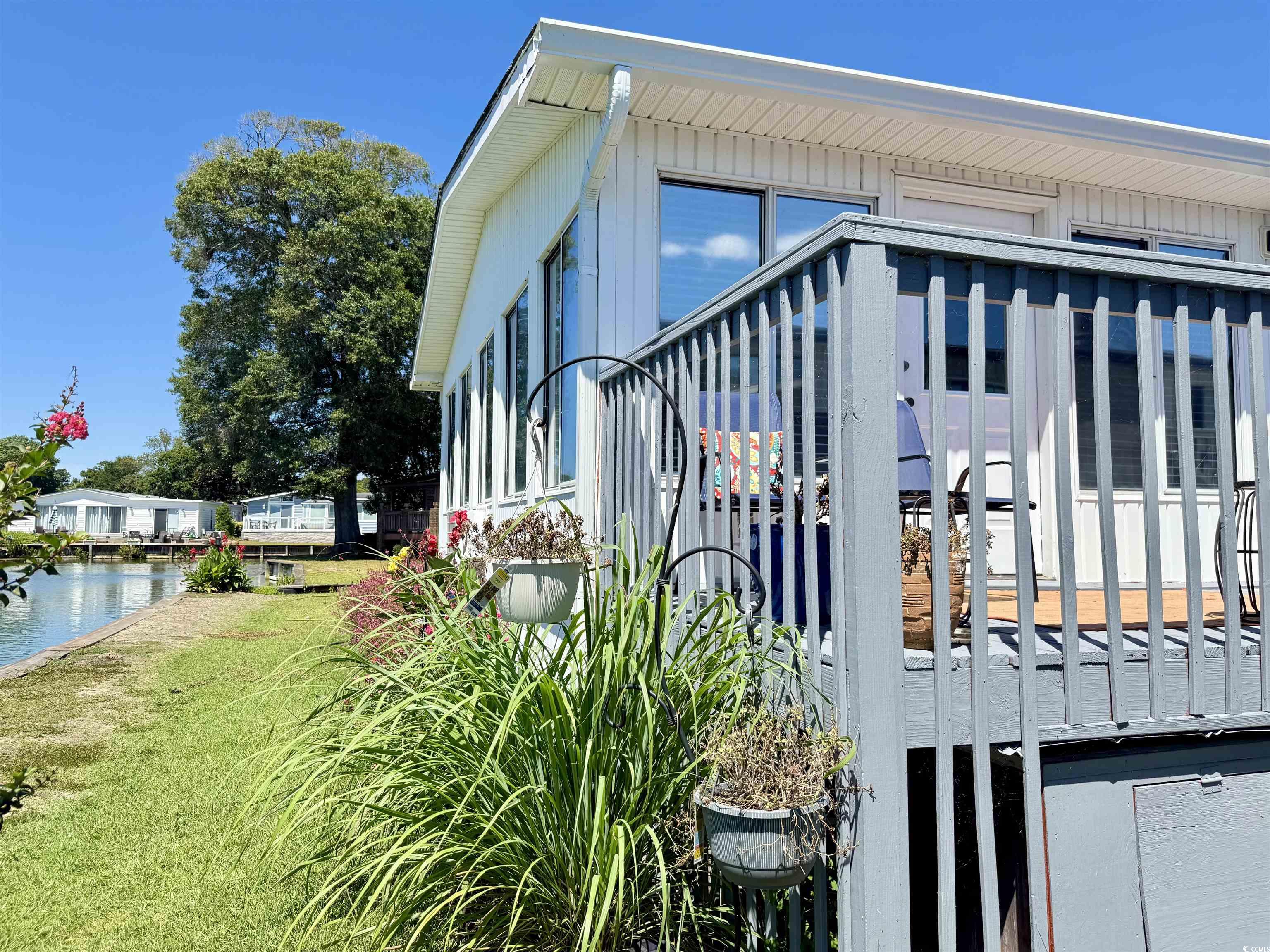 405 Twin Lakes Surfside Beach, SC 29575 - Photo 29 of 36 View of side of home with a yard