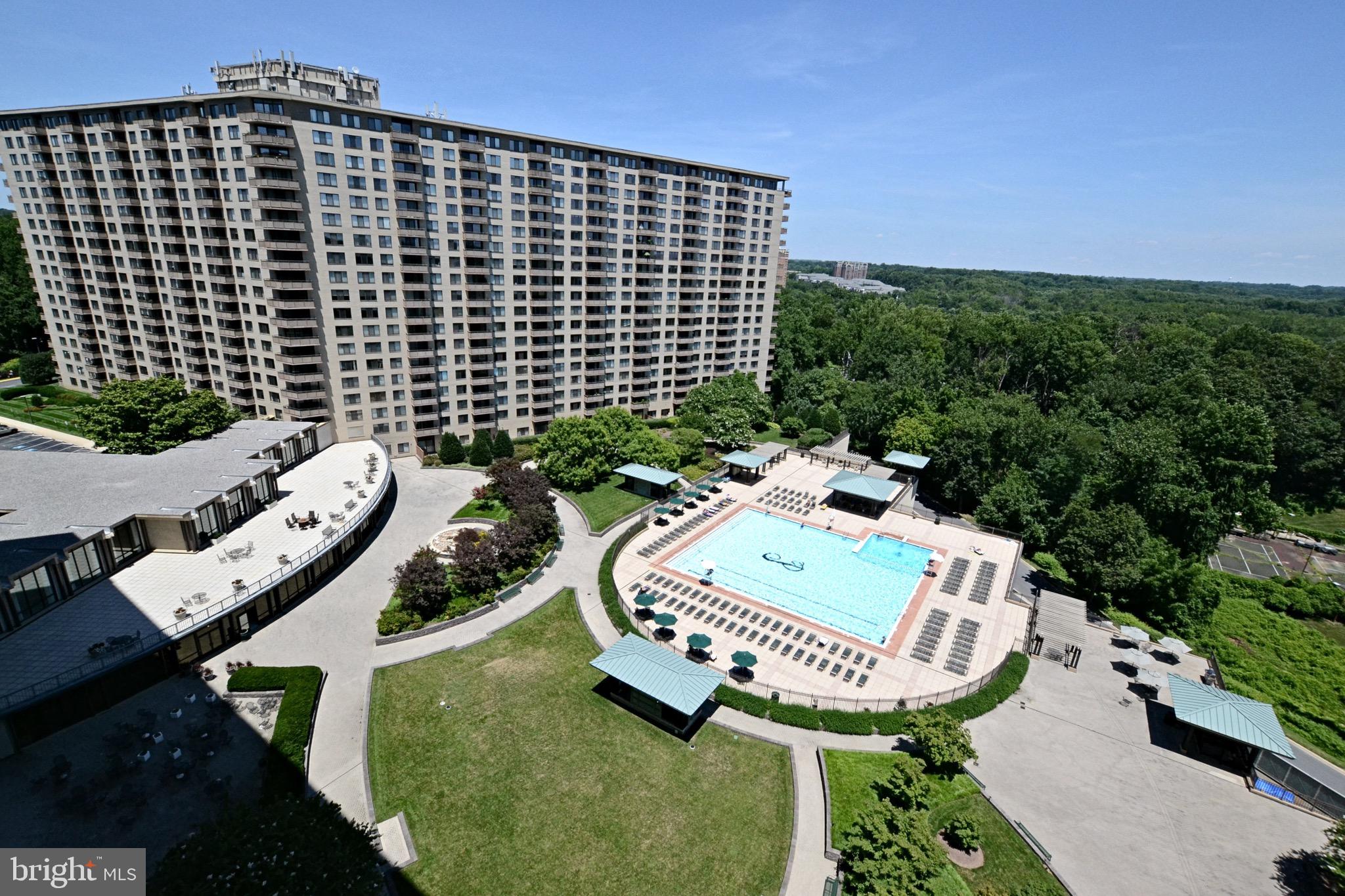 5225 Pooks Hill Road, Unit 308N Bethesda, MD 20814 - Photo 21 of 41 an aerial view of a balcony with chairs