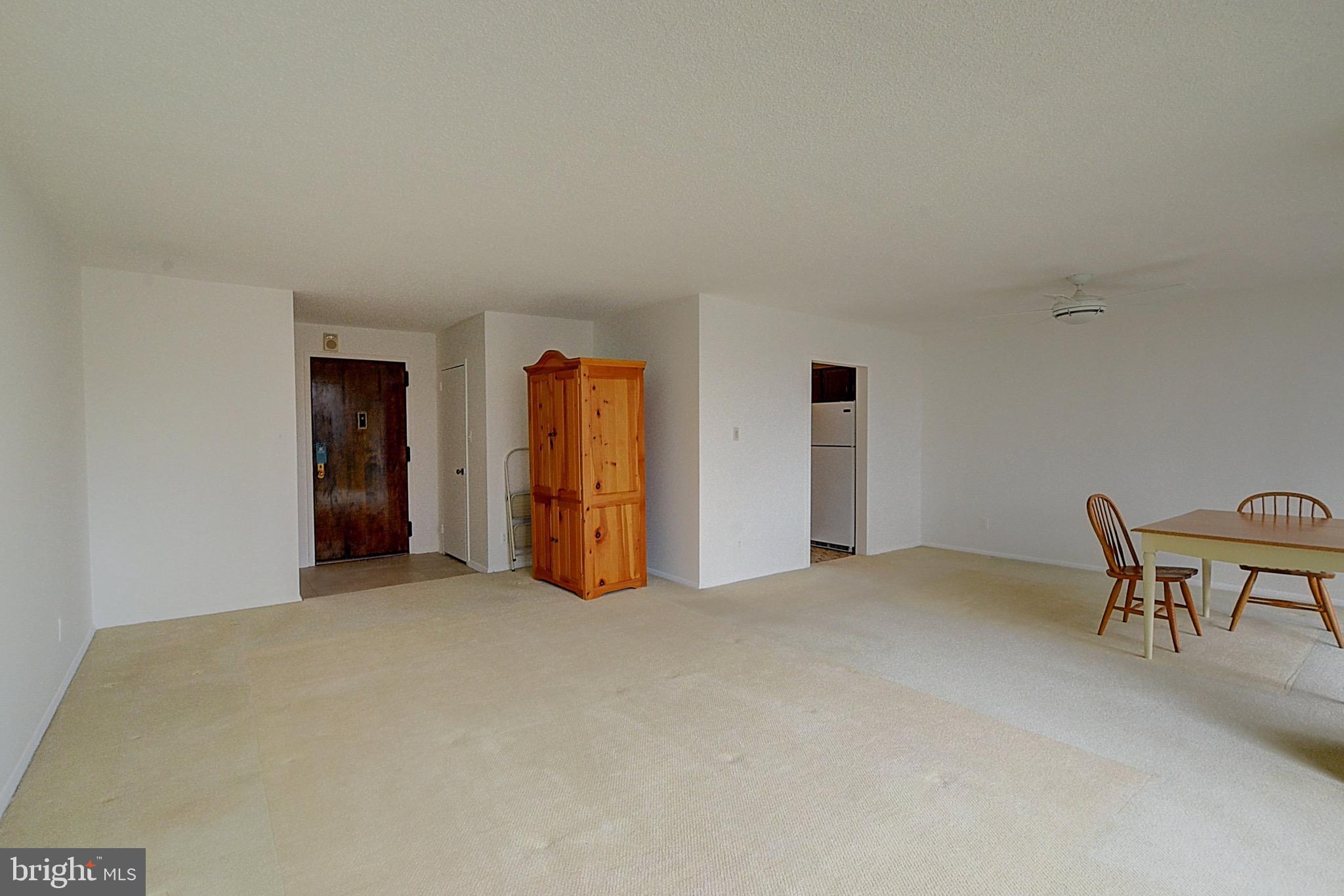 5225 Pooks Hill Road, Unit 308N Bethesda, MD 20814 - Photo 3 of 41 a view of an empty room with closet
