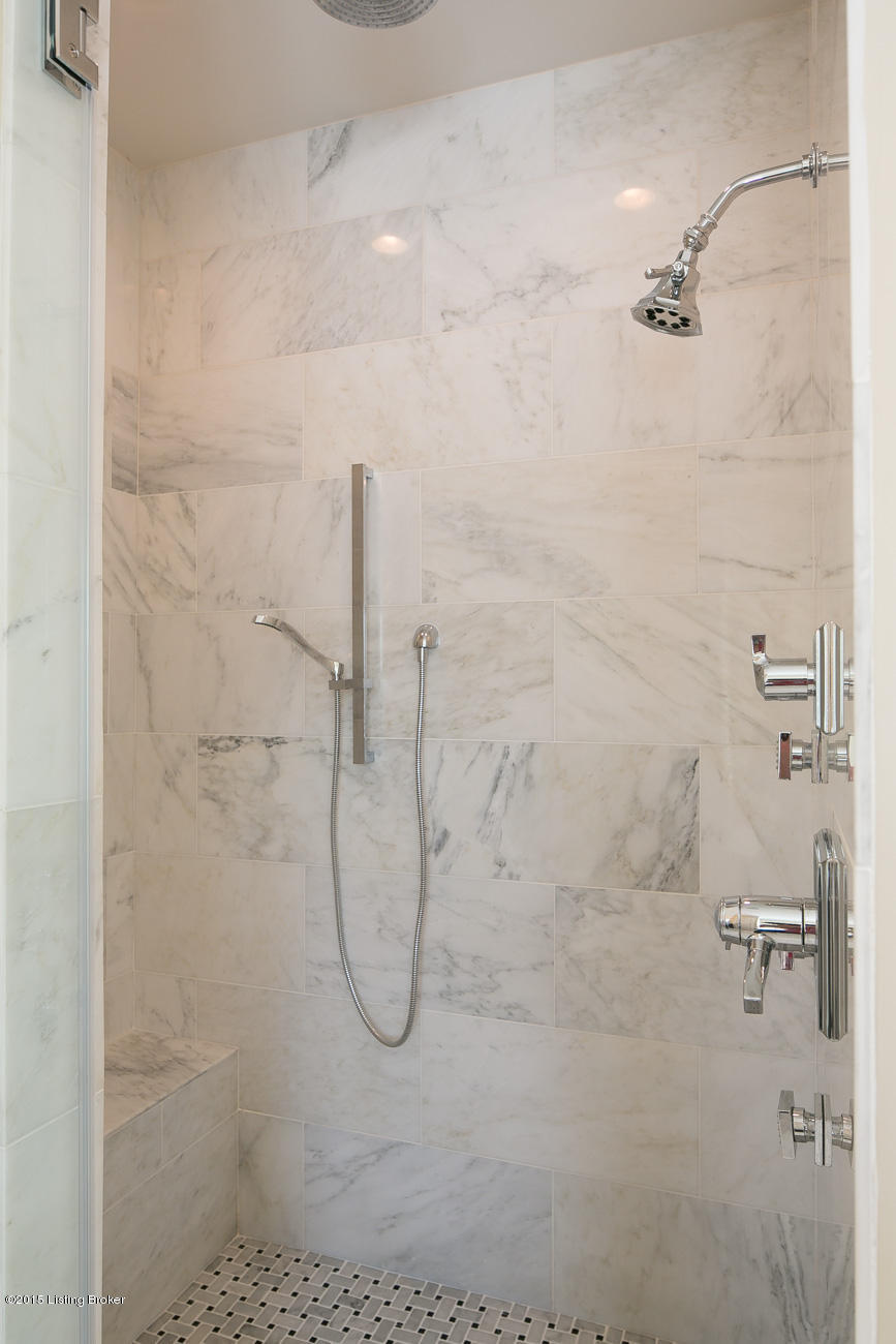 1104 Bellewood Road Anchorage, KY 40223 - Photo 34 of 63 A seamless glass door...a rain shower head and a hand held shower, as well.