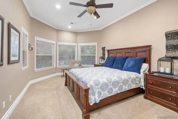 a view of a dining room with furniture wooden floor and chandelier