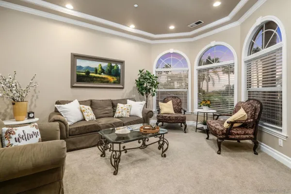 a bathroom with a sink mirror and toilet