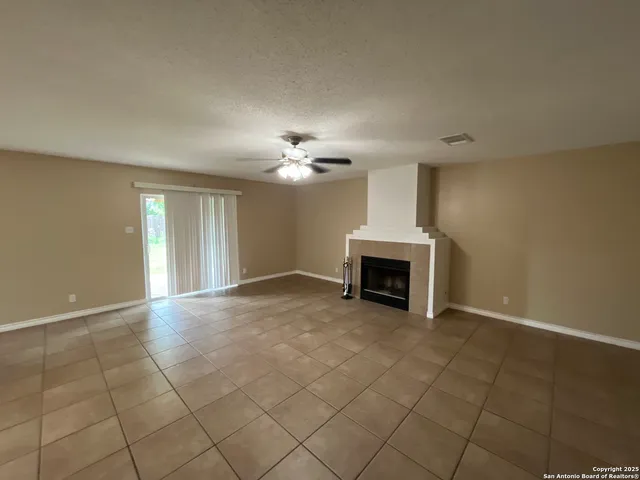 a view of a livingroom and a kitchen with furniture and a kitchen