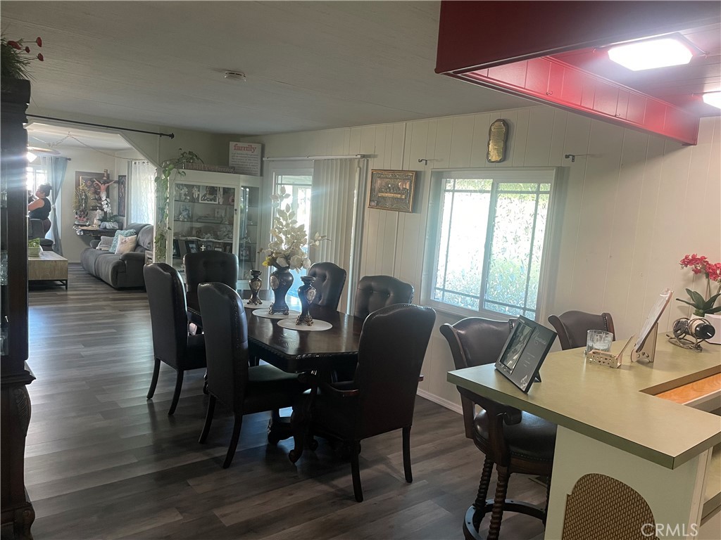 300 North Rampart Street, Unit 157 Orange, CA 92868 - Photo 7 of 14 a view of a dining room with furniture