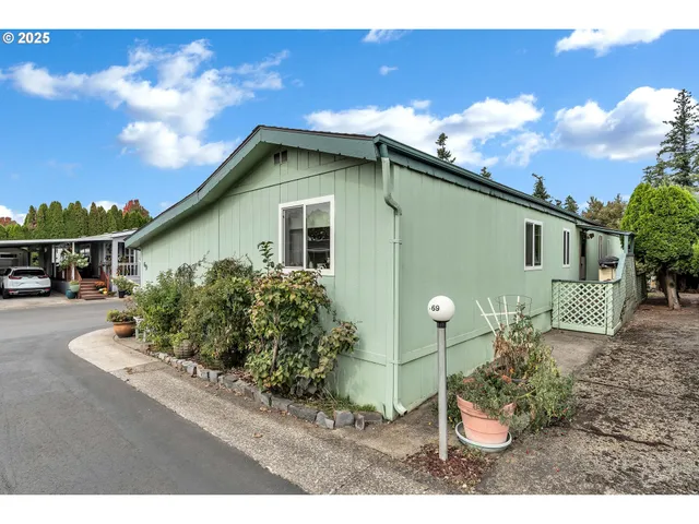 a view of a park with large trees