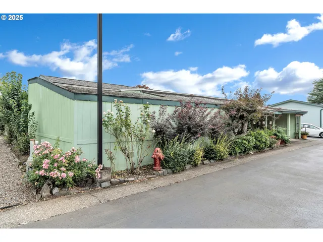 a ocean view with a sitting space and garden view