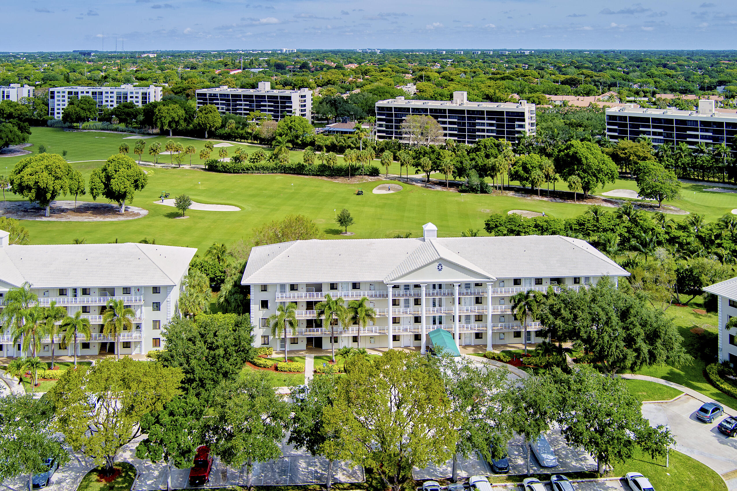 6145 Balboa Circle, Unit 103 Boca Raton, FL 33433 - Photo 31 of 31 an aerial view of a house with a garden