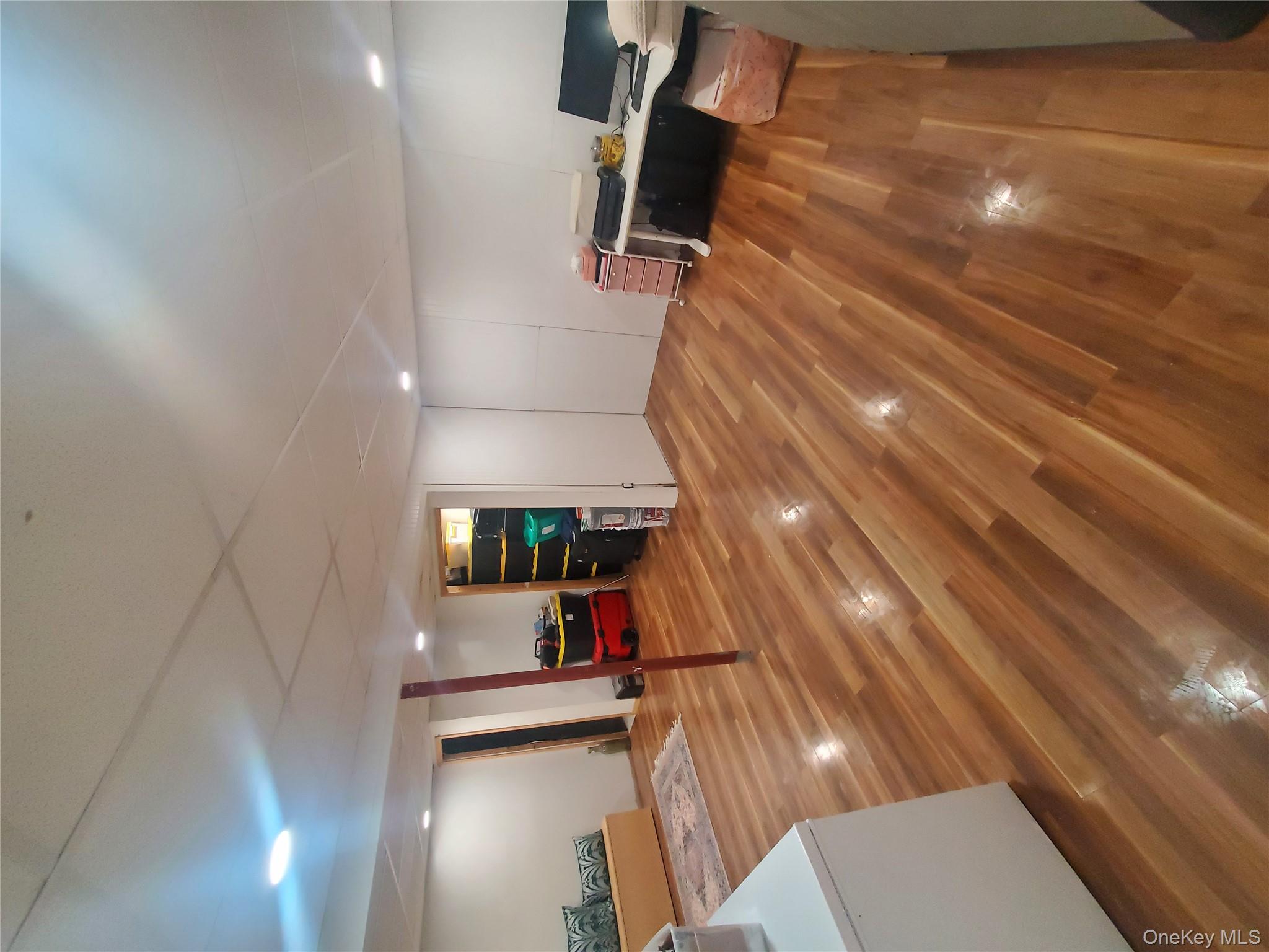 117 North Coleman Road Centereach, NY 11720 - Photo 20 of 29 a view of a room with wooden floor