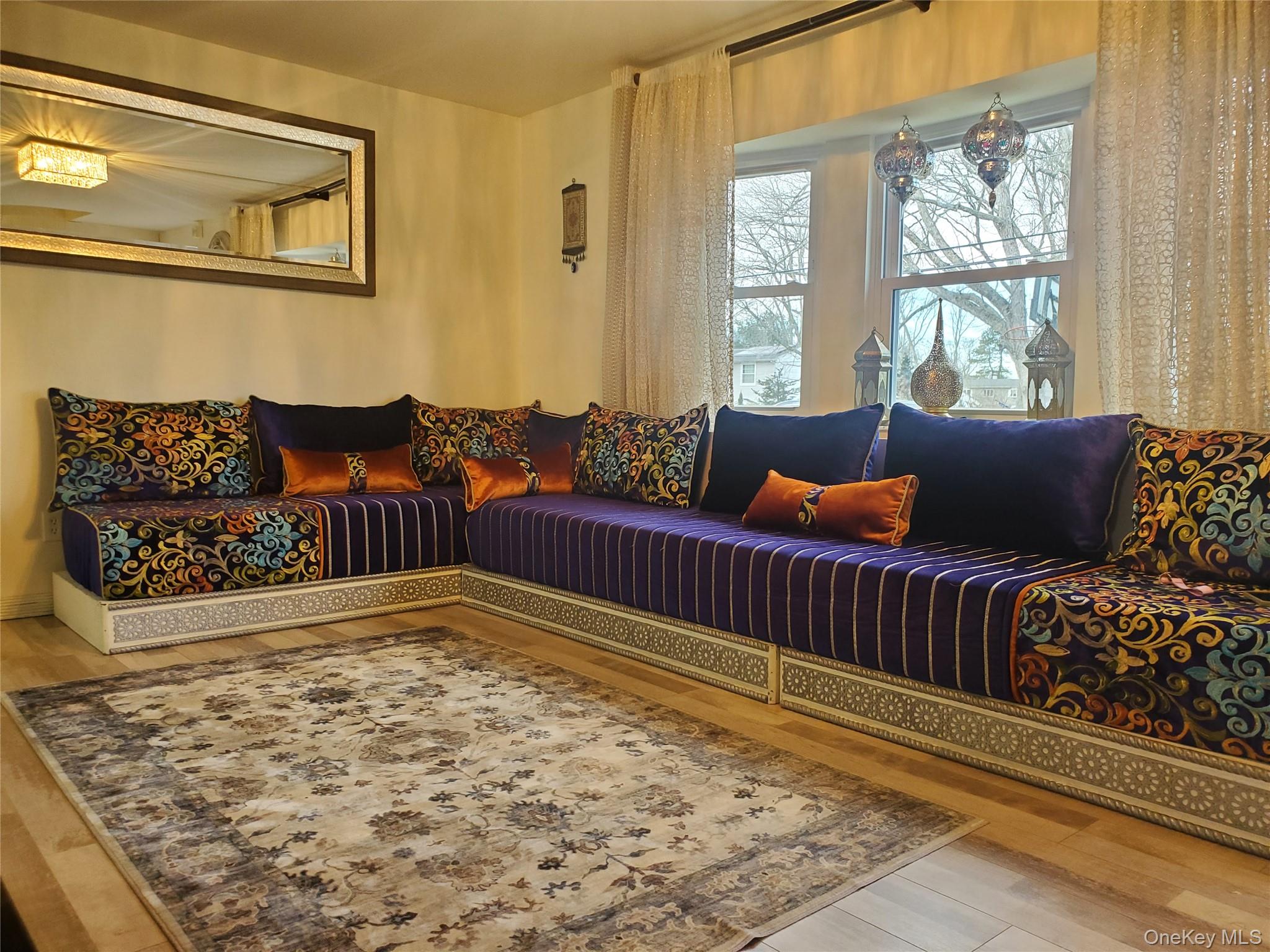 117 North Coleman Road Centereach, NY 11720 - Photo 10 of 26 Living area featuring light wood-type flooring