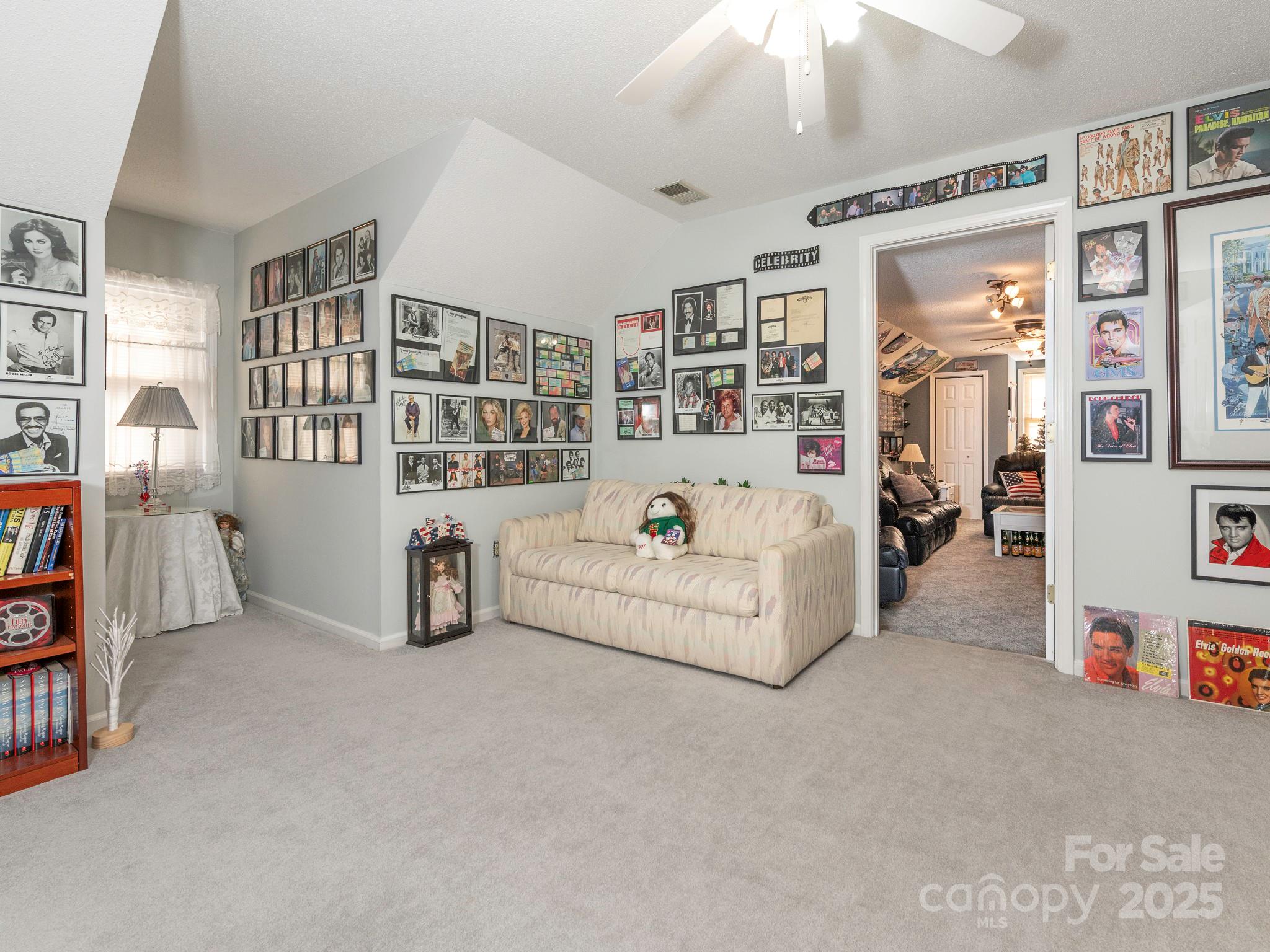 1800 Lake Lynn Road Concord, NC 28025 - Photo 15 of 45 a living room with furniture and white walls