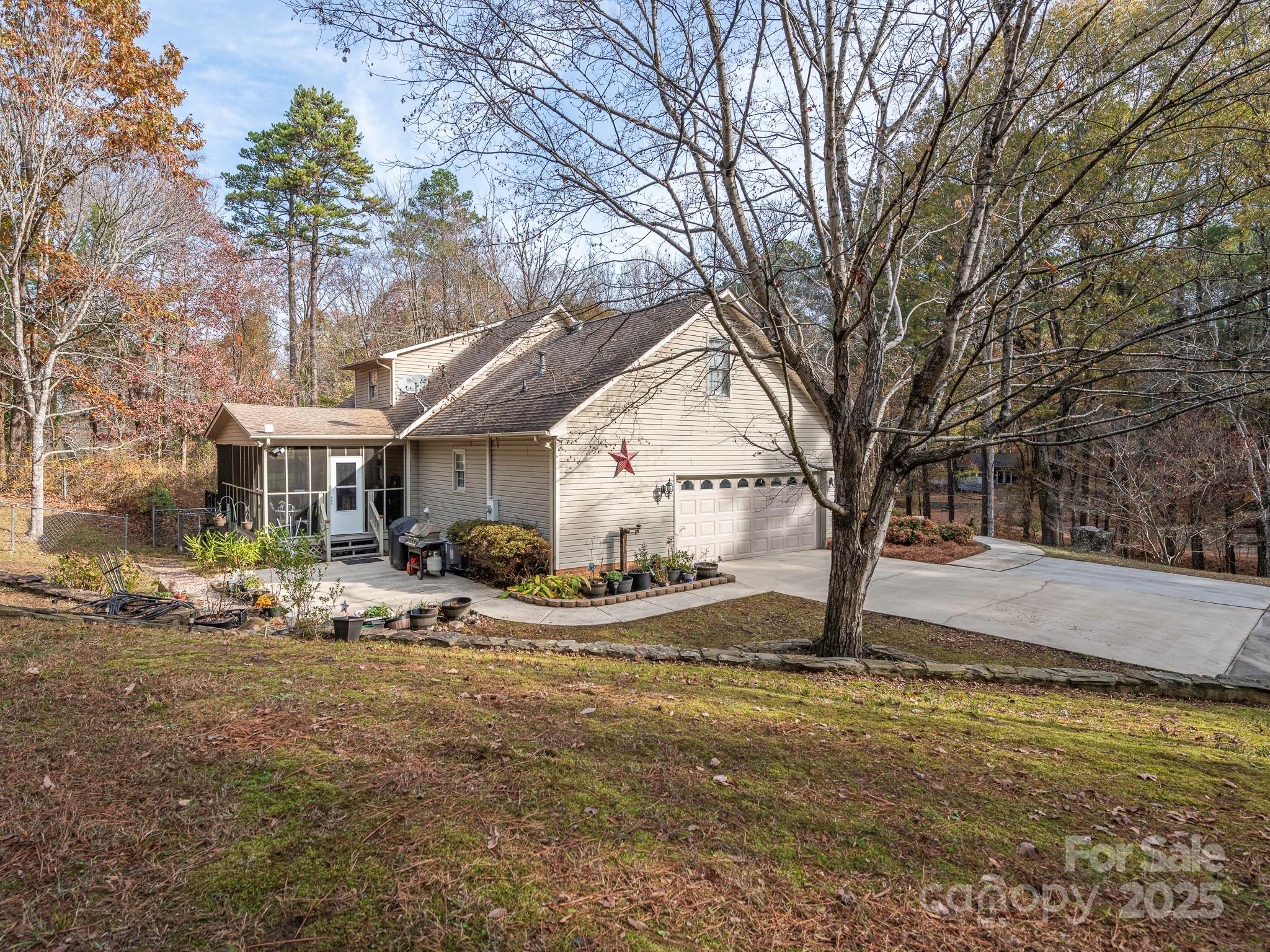 1800 Lake Lynn Road Concord, NC 28025 - Photo 2 of 45 a view of a house with backyard
