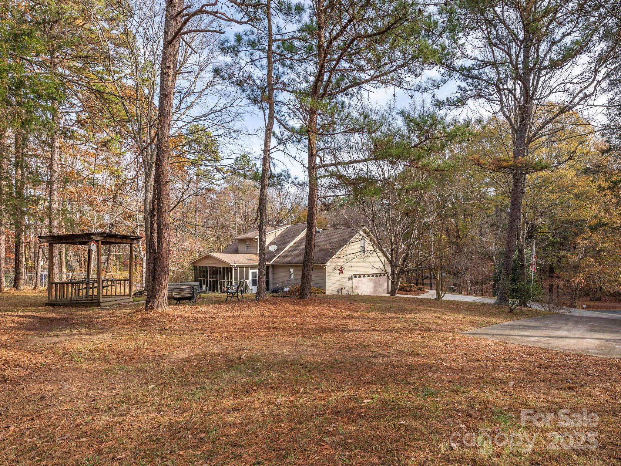 1800 Lake Lynn Road Concord, NC 28025 - Photo 21 of 45 a view of a outdoor space with trees