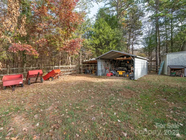 a view of a park with large trees