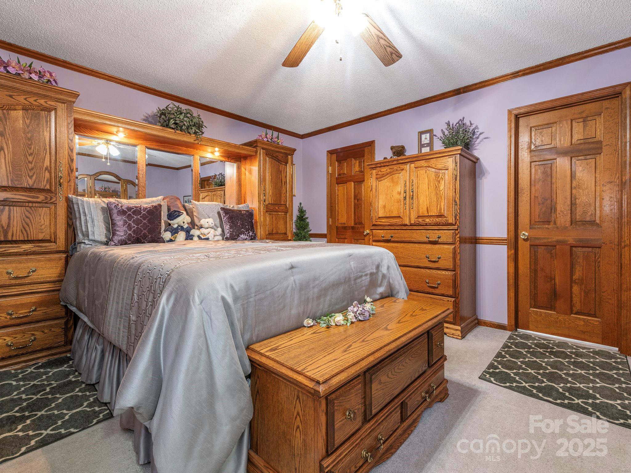 1800 Lake Lynn Road Concord, NC 28025 - Photo 29 of 45 a bedroom with a bed and wooden floor
