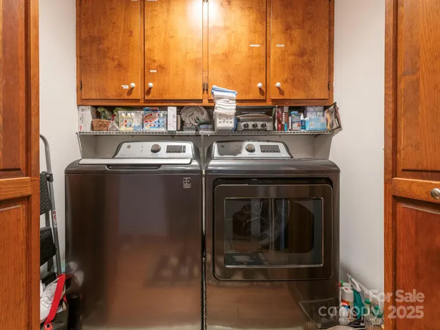 a utility room with washer and dryer