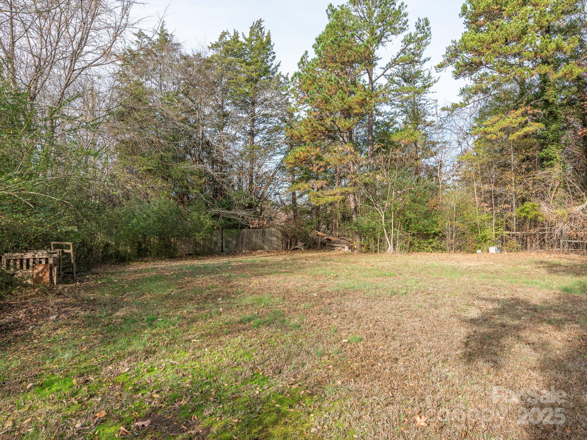 1800 Lake Lynn Road Concord, NC 28025 - Photo 40 of 45 a view of a field with trees in the background