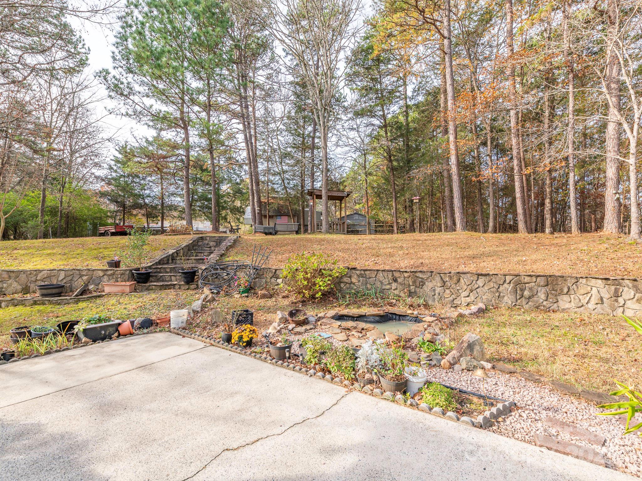 1800 Lake Lynn Road Concord, NC 28025 - Photo 41 of 45 a view of a yard with cars