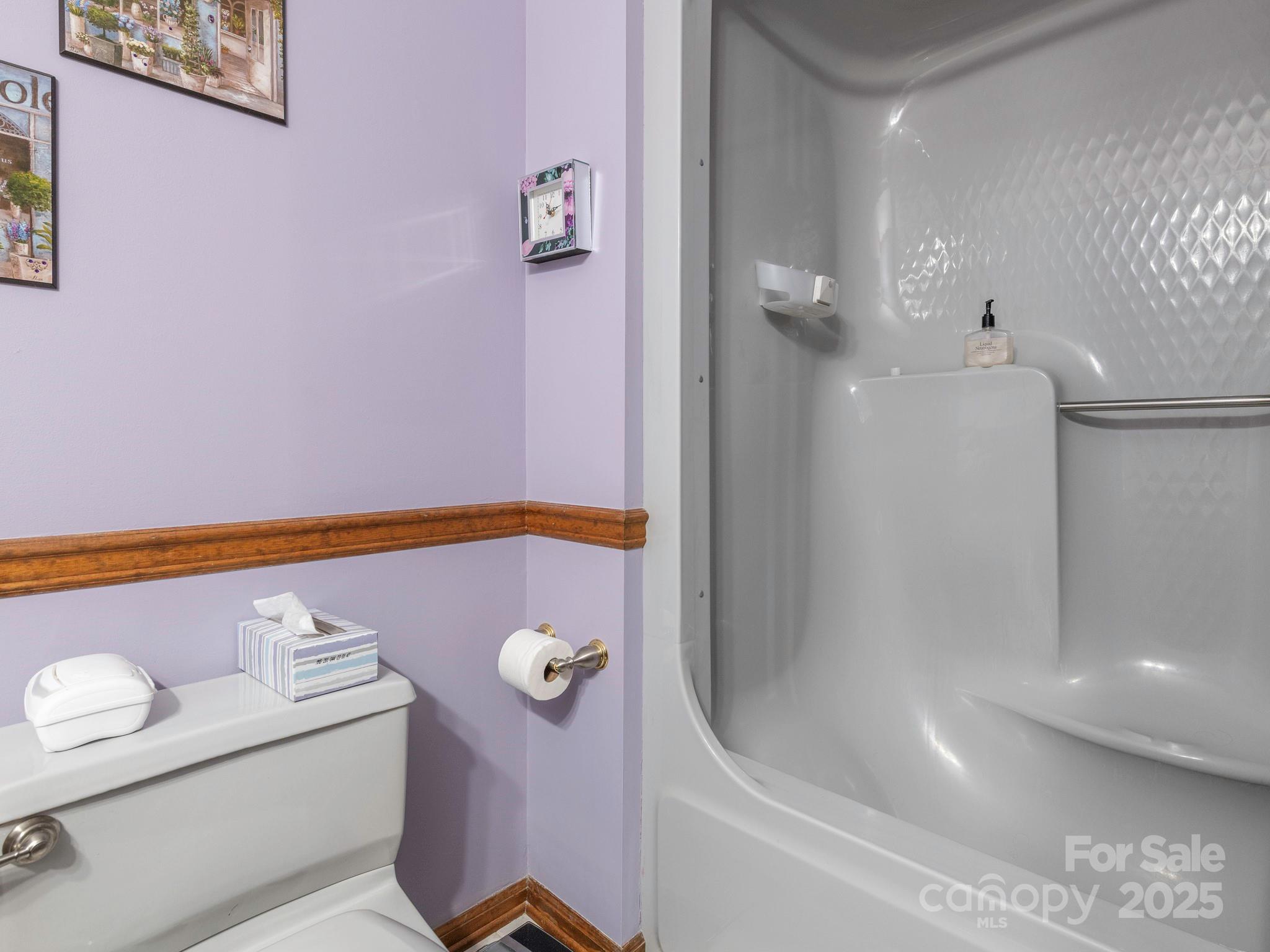 1800 Lake Lynn Road Concord, NC 28025 - Photo 10 of 45 a bathroom with a tub and shower