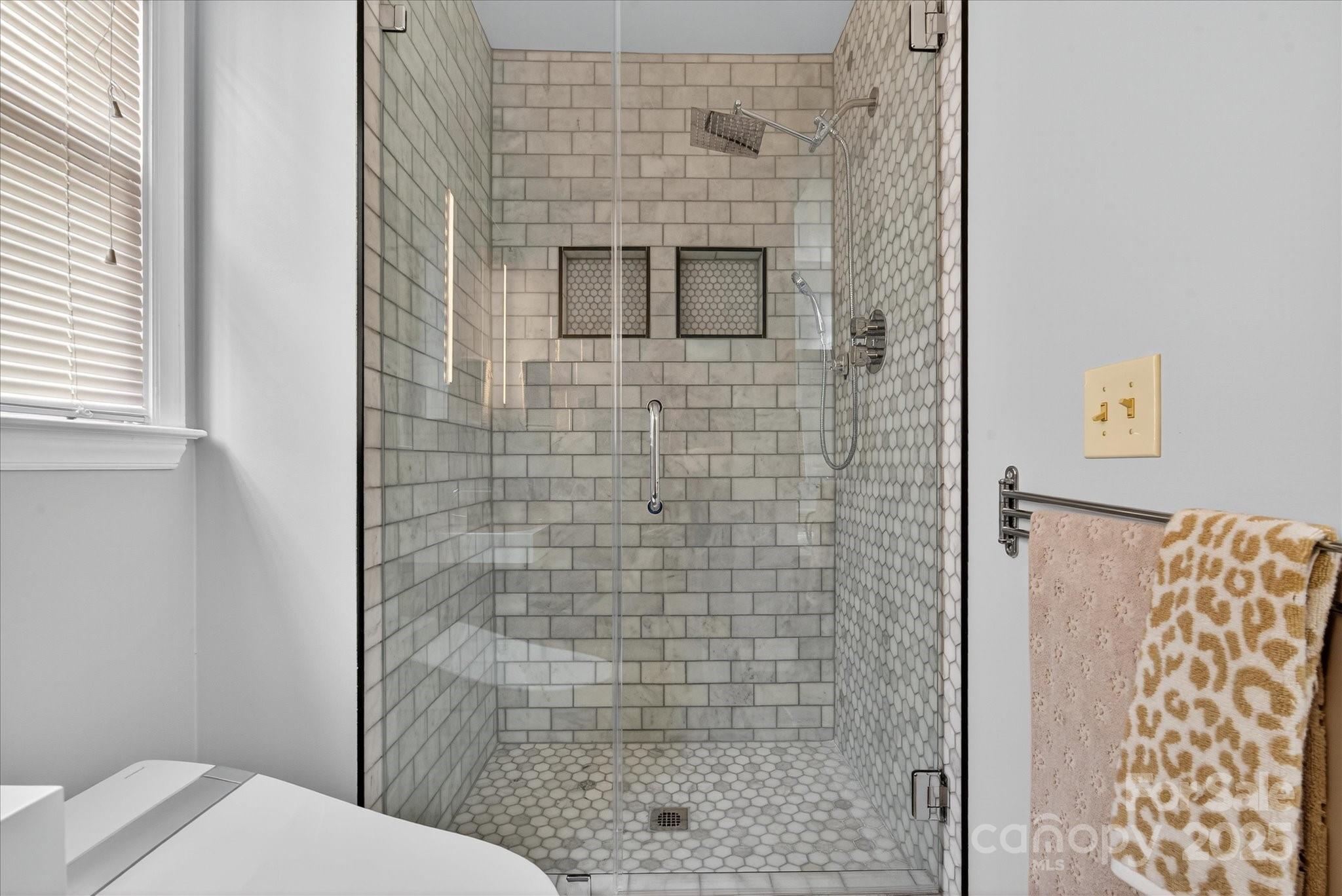 11710 Buckstone Lane Charlotte, NC 28277 - Photo 20 of 42 a bathroom with a toilet and shower