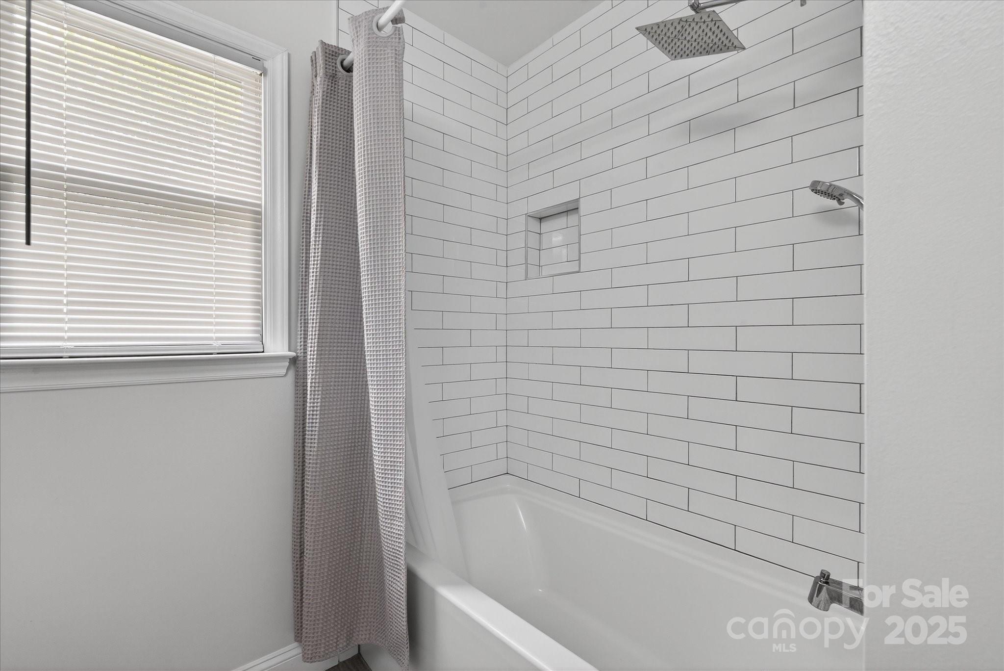 11710 Buckstone Lane Charlotte, NC 28277 - Photo 25 of 42 a bathroom with a bathtub