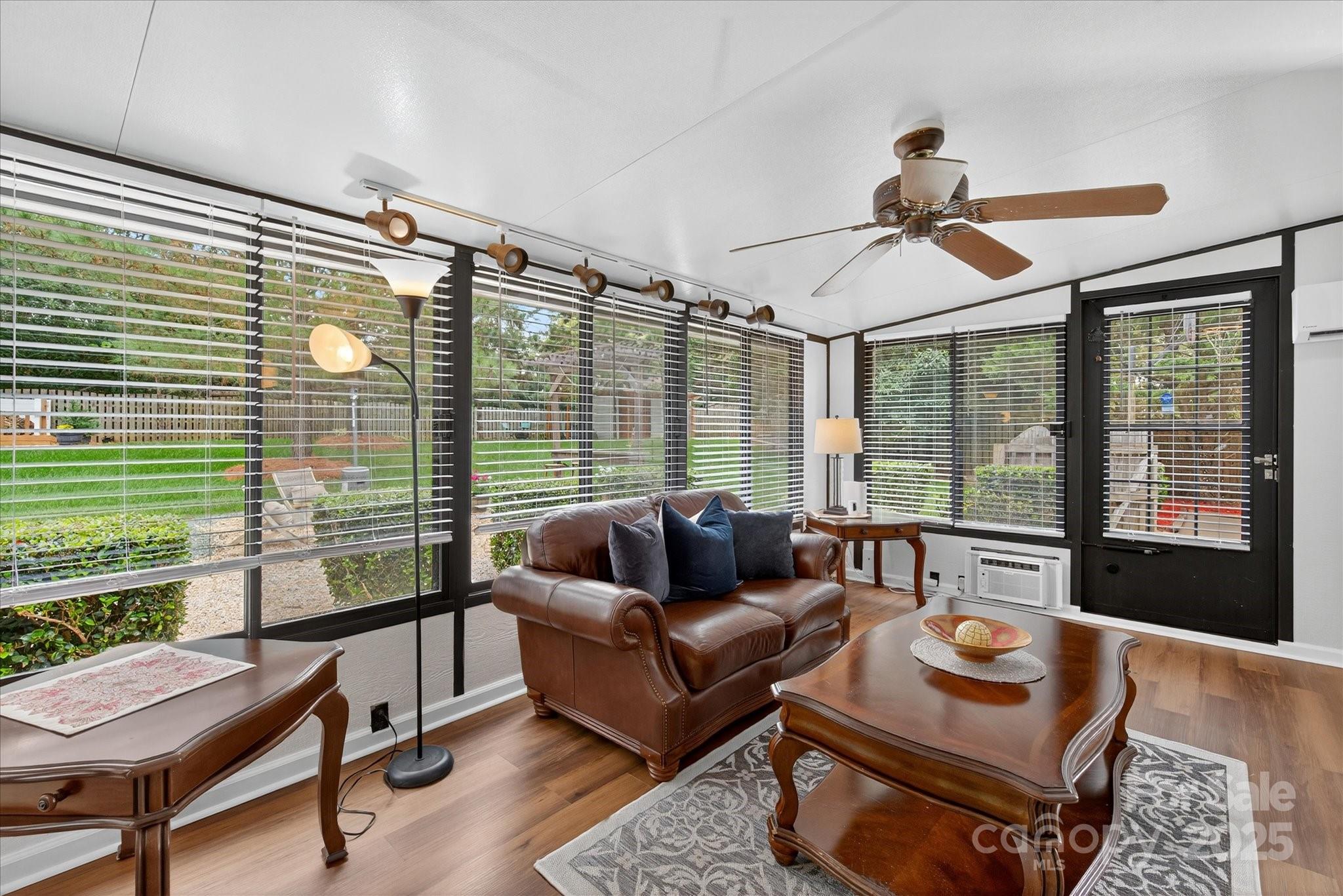 11710 Buckstone Lane Charlotte, NC 28277 - Photo 26 of 42 a living room with furniture and a window