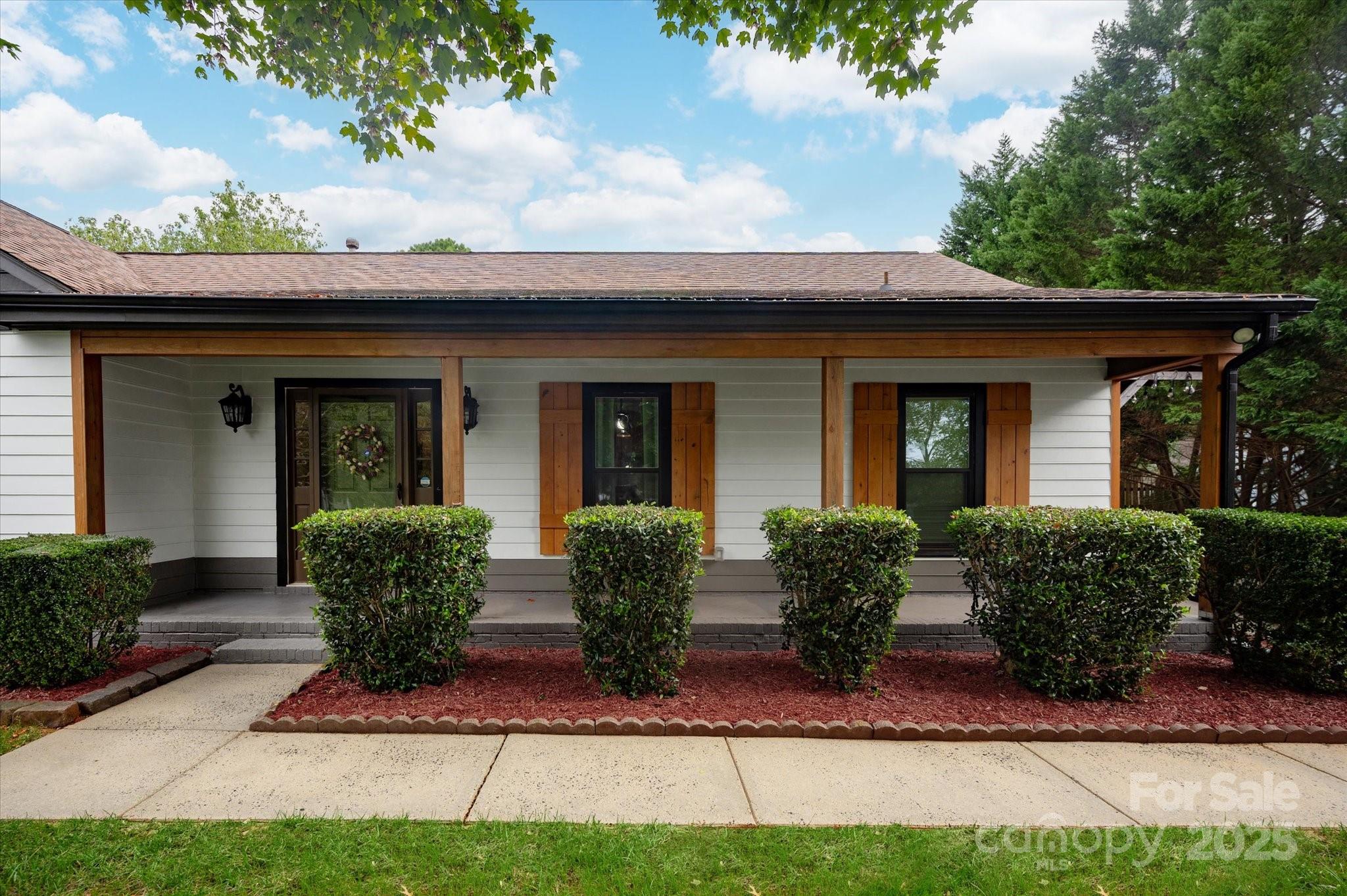 11710 Buckstone Lane Charlotte, NC 28277 - Photo 3 of 42 front view of house with a yard