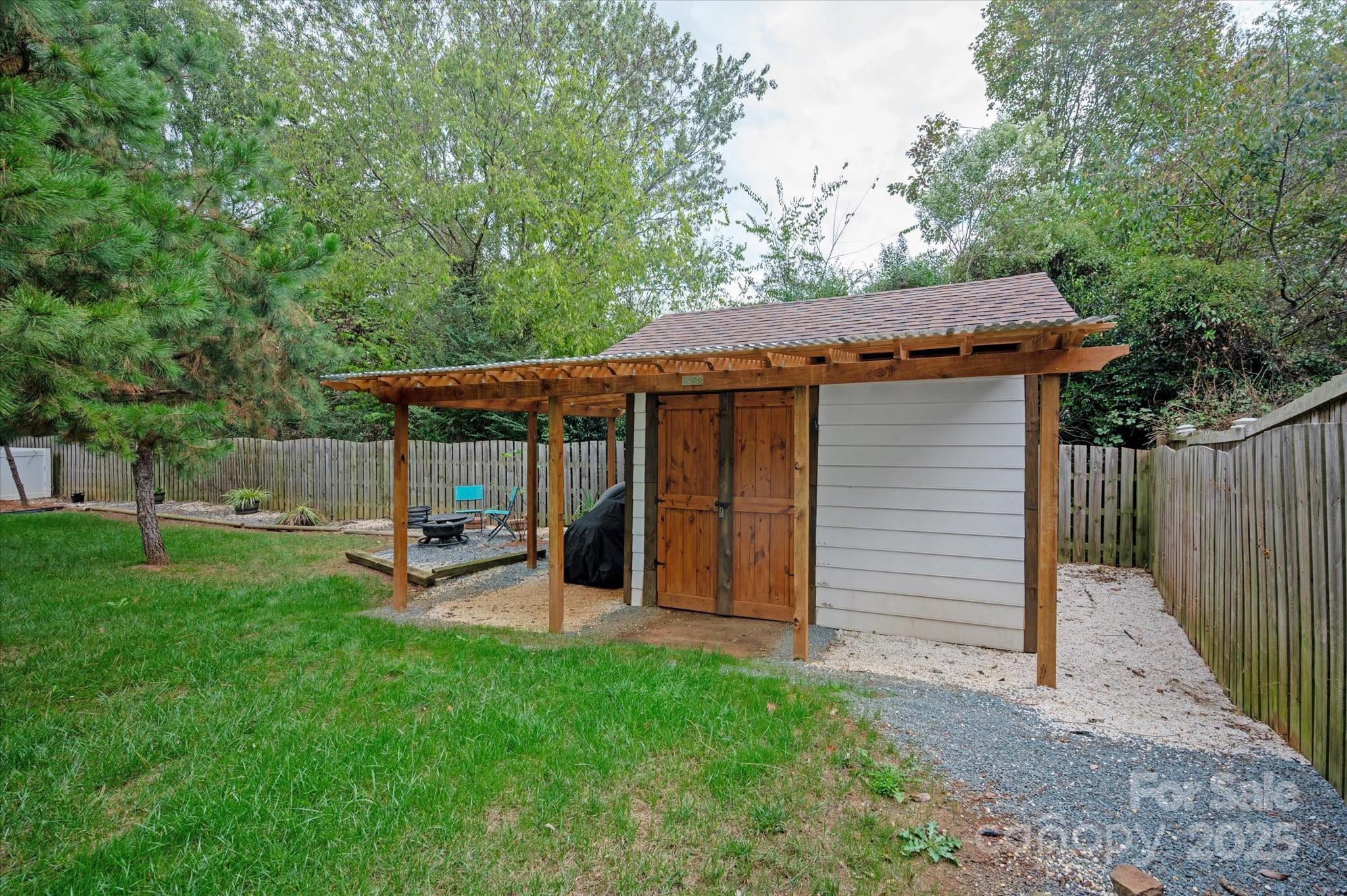 11710 Buckstone Lane Charlotte, NC 28277 - Photo 32 of 42 a view of a house with a backyard