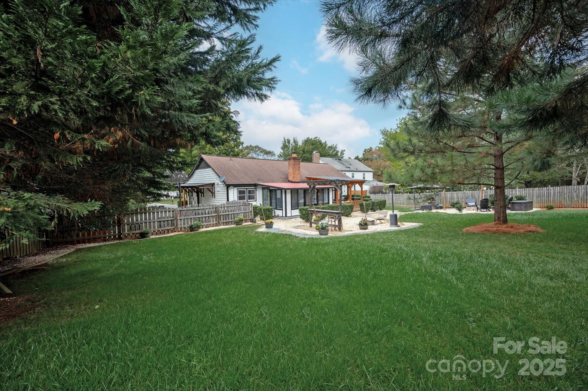 11710 Buckstone Lane Charlotte, NC 28277 - Photo 33 of 42 a front view of a house with garden and a garden