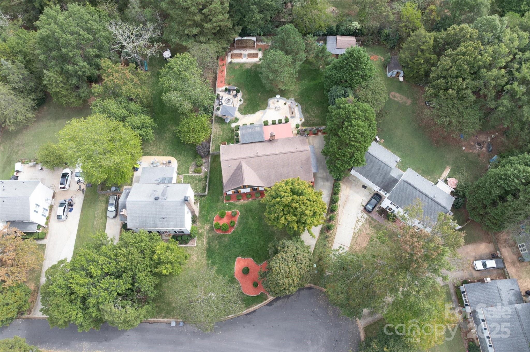 11710 Buckstone Lane Charlotte, NC 28277 - Photo 36 of 42 an aerial view of a house with a yard and fountain