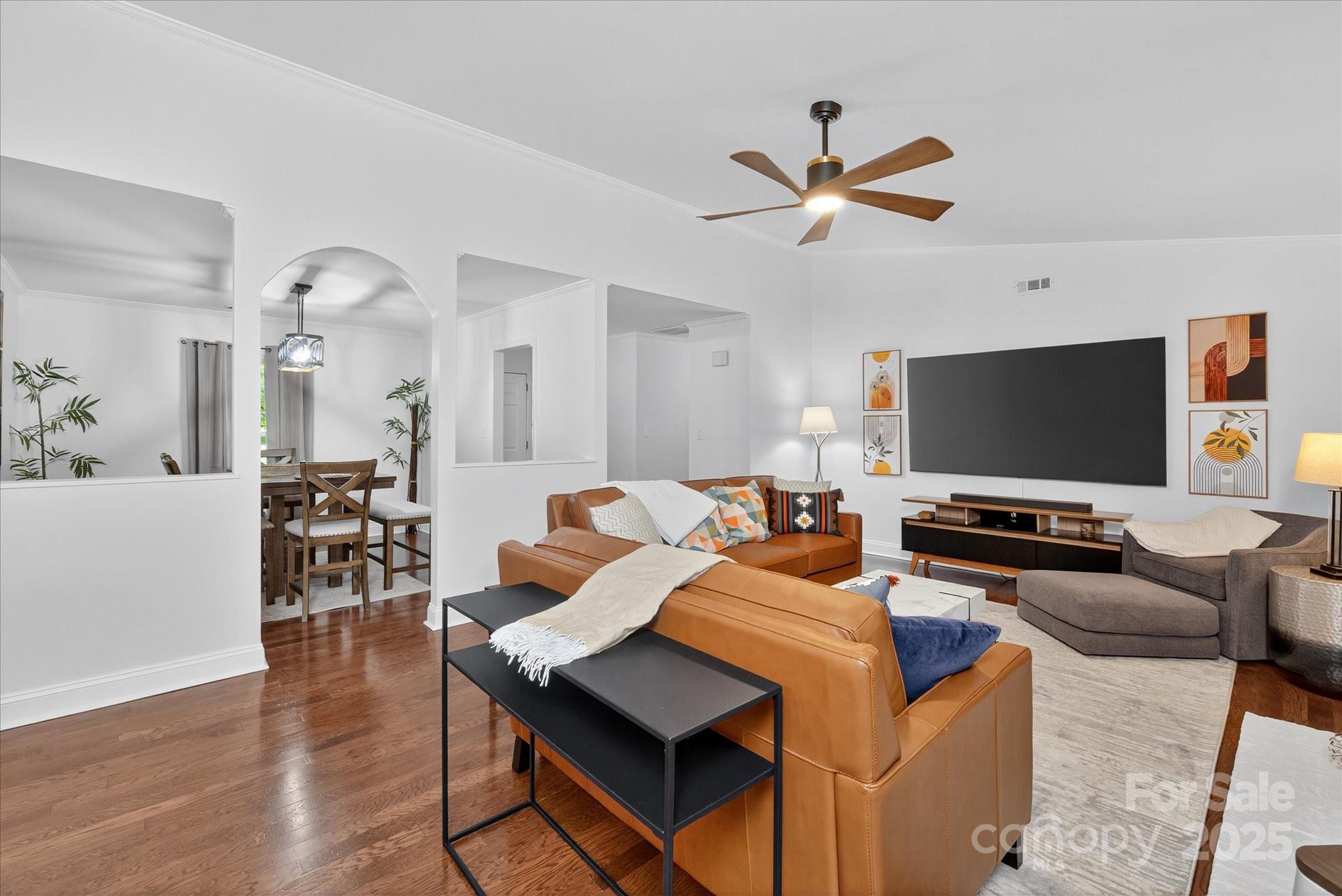 11710 Buckstone Lane Charlotte, NC 28277 - Photo 9 of 42 a living room with furniture and a flat screen tv