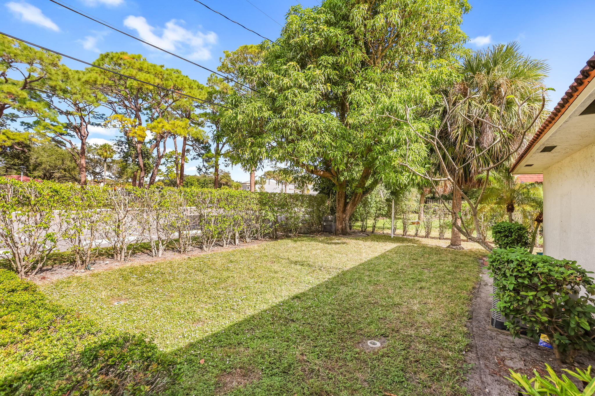 89 Lariat Circle Boca Raton, FL 33487 - Photo 27 of 31 a view of yard with swimming pool