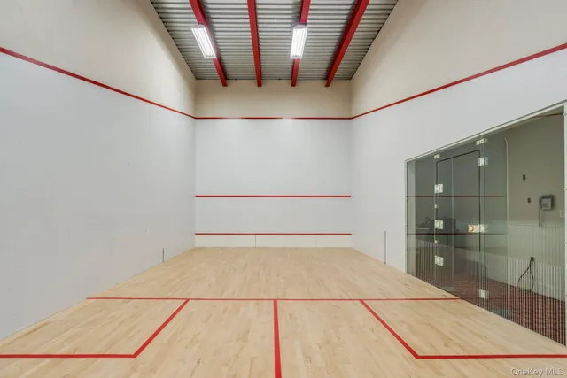 a bedroom with a bed and cabinets