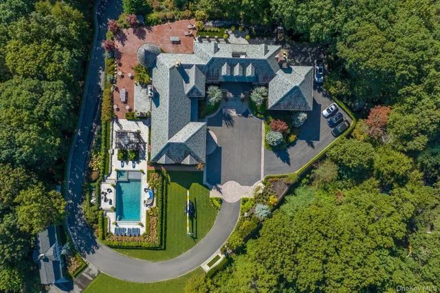 an aerial view of houses with outdoor space