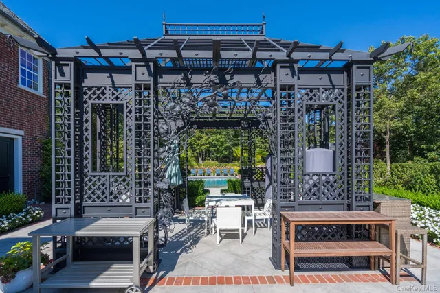 a view of a backyard with a patio