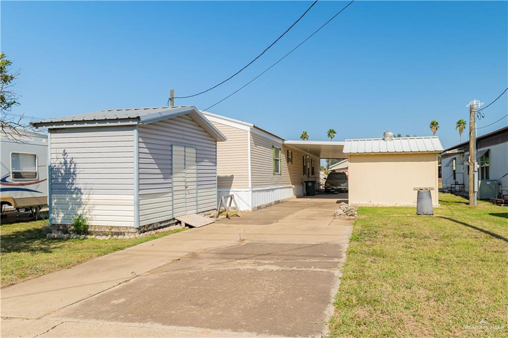 2004 Vernon Avenue Mission, TX 78572 - Photo 17 of 20 a view of a house with a patio