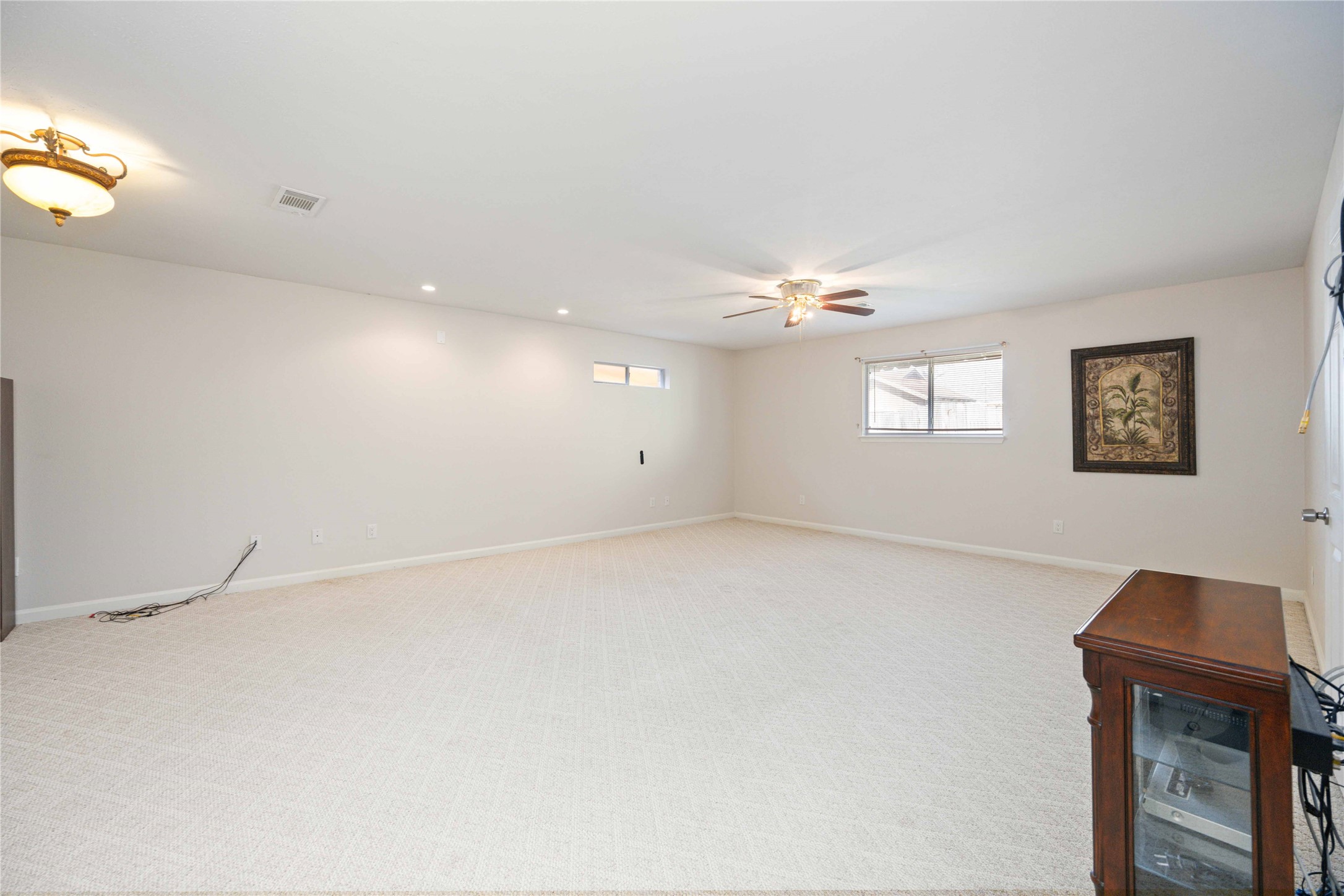 3910 Brookston Street Houston, TX 77045 - Photo 21 of 29 a view of an empty room with a window