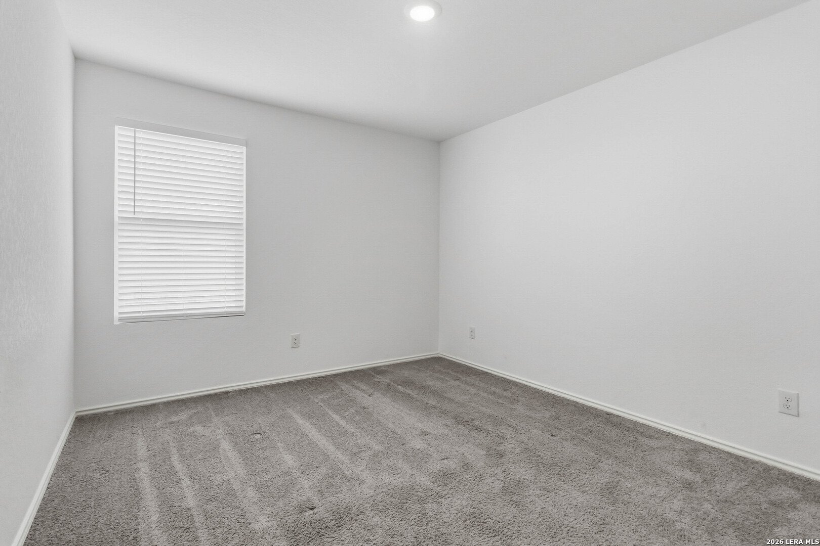 5155 Fowler Crest Converse, TX 78109 - Photo 16 of 20 an empty room with a window