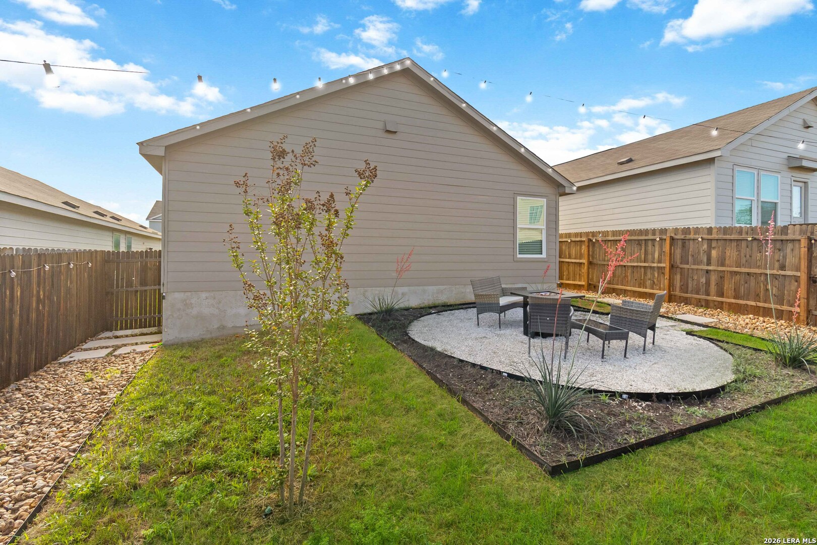 5155 Fowler Crest Converse, TX 78109 - Photo 19 of 20 a view of an house with backyard and patio