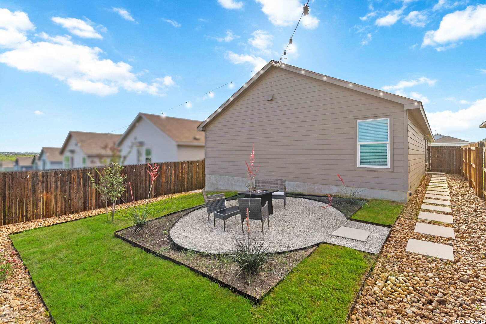 5155 Fowler Crest Converse, TX 78109 - Photo 3 of 20 a front view of a house with garden