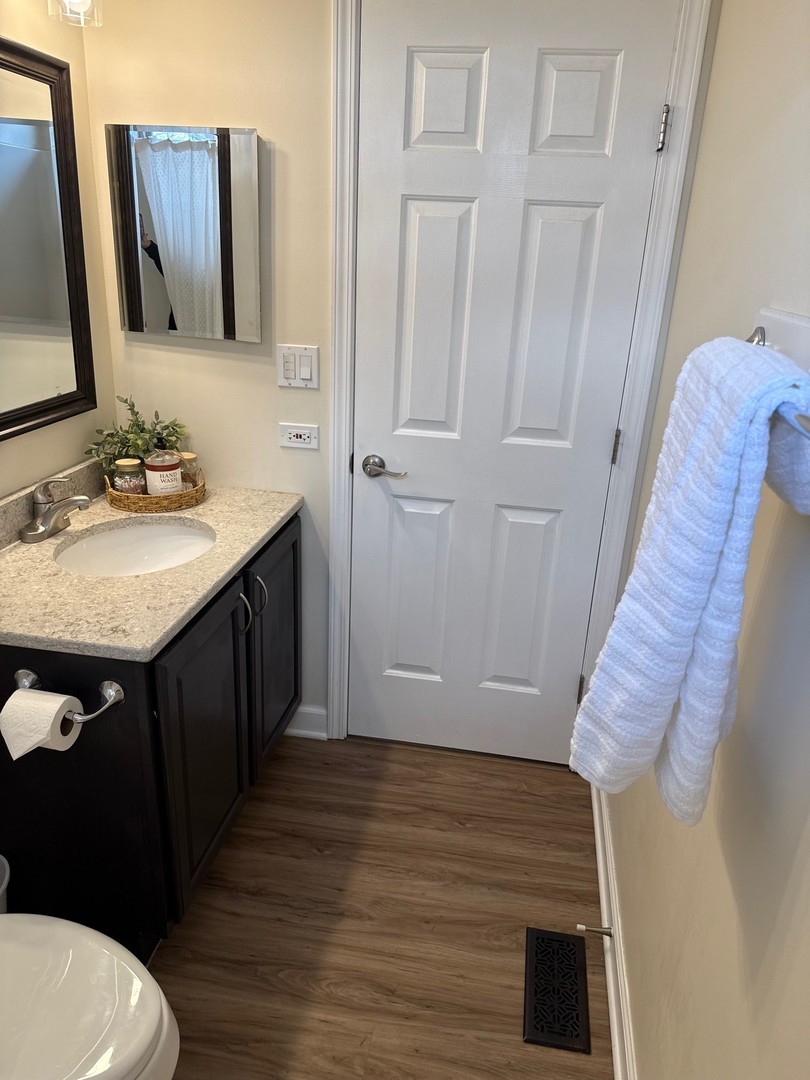 1785 Briggs Street Sycamore, IL 60178 - Photo 26 of 43 a bathroom with a sink and a mirror