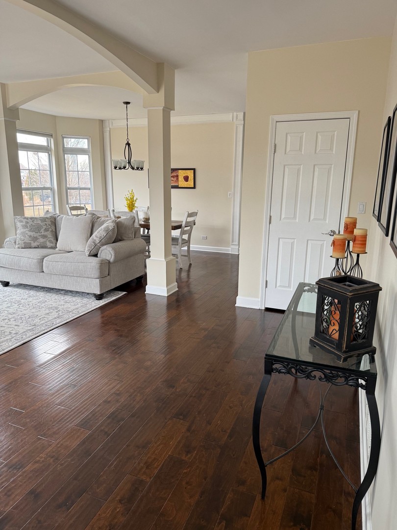 1785 Briggs Street Sycamore, IL 60178 - Photo 3 of 43 a living room with furniture and wooden floor