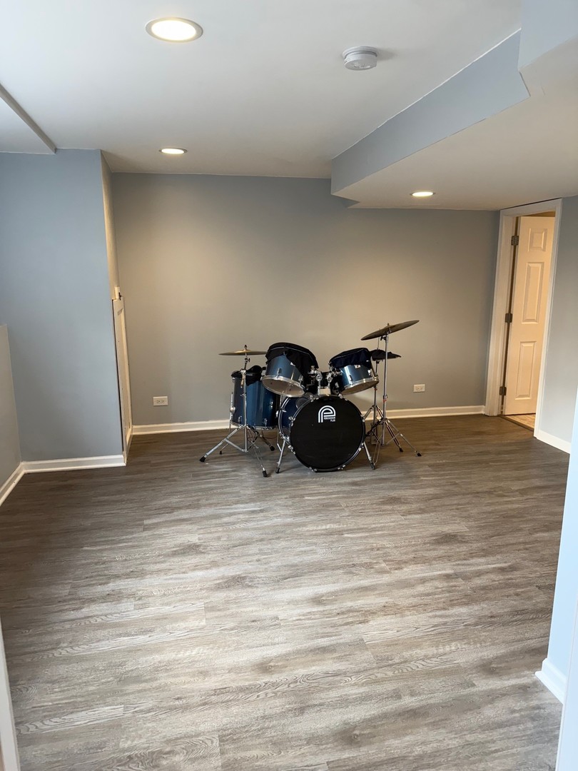 1785 Briggs Street Sycamore, IL 60178 - Photo 31 of 43 a view of a room with wooden floor