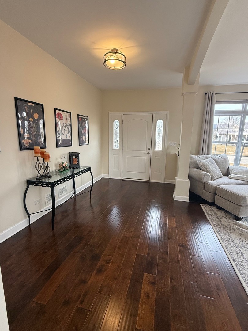 1785 Briggs Street Sycamore, IL 60178 - Photo 4 of 43 a living room with furniture and wooden floor